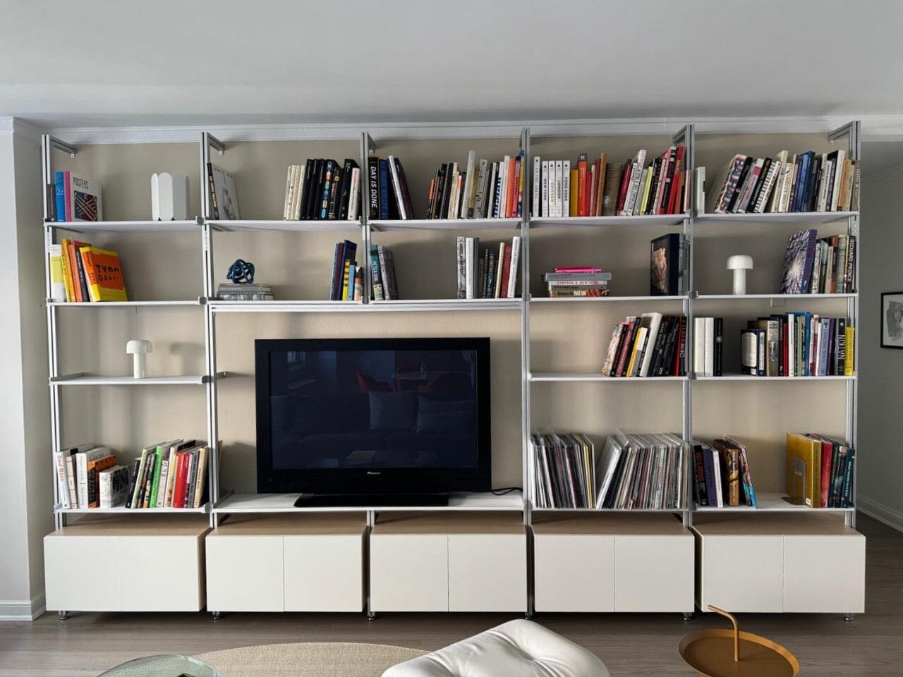 Couple Uses Shelves to Maximize Storage Space in Chicago Apartment