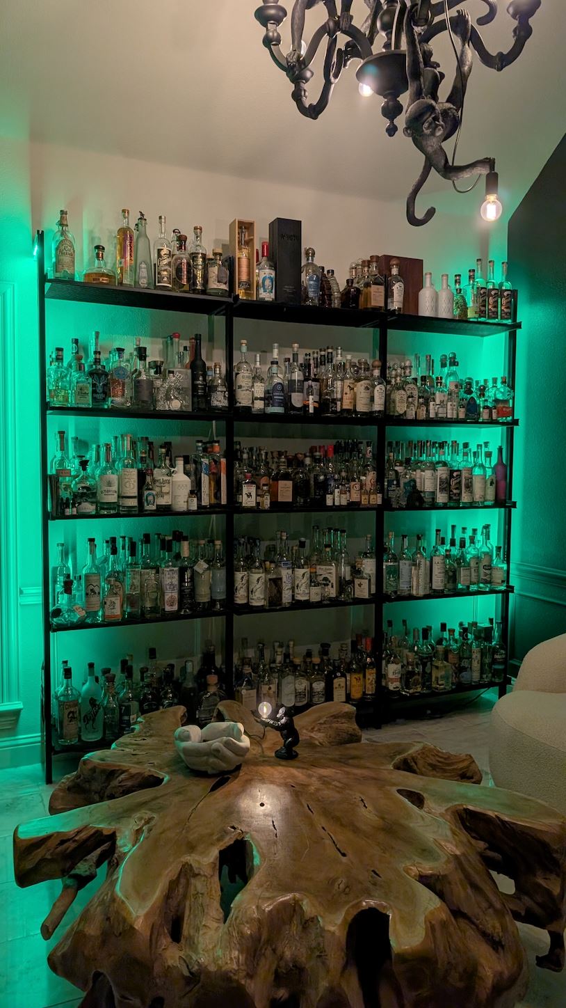 Tequila Collector Uses Shelves to House His Collection