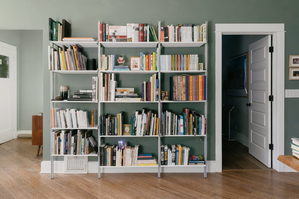 Architectural Photographer Uses Shelves to Display Book Collection